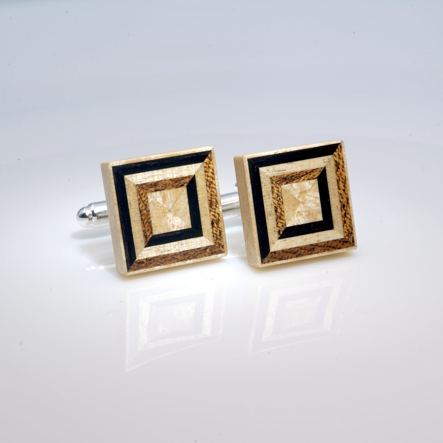 Sparkling cufflinks made of wood